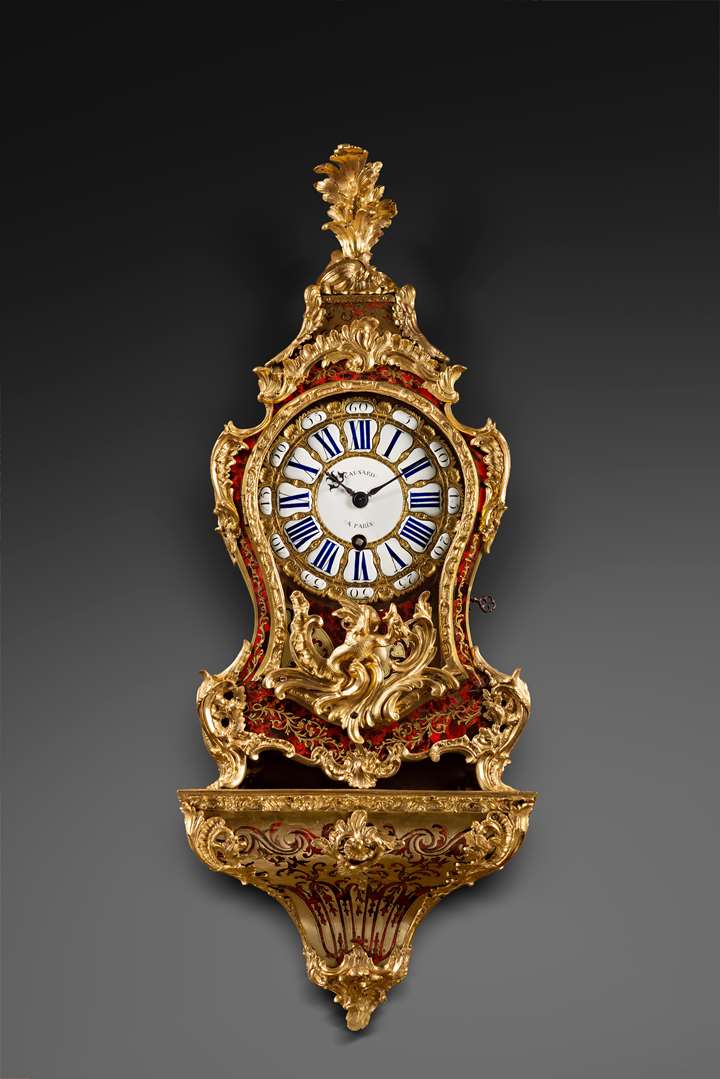 A Louis XV ormolu-mounted tortoise-shell cartel clock and bracket